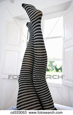 Stock Image - at-home, carnality, barefoot, amusing. Fotosearch