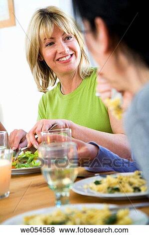 Stock Photo - at-home, chat, 30's. Fotosearch