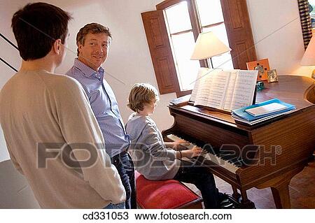 Stock Image - at-home, child, boy, 30's. Fotosearch