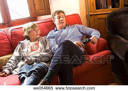 Stock Photography - at-home, child, boy, addiction. Fotosearch