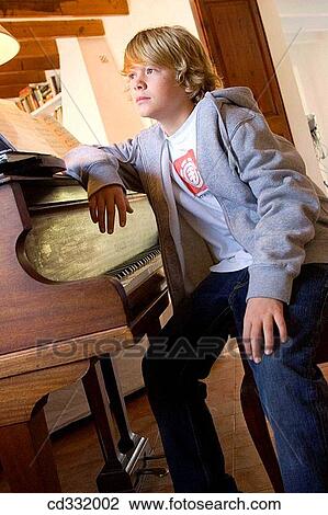at-home, child, boy, blond, absorbed View Large Photo Image Stock Image - at-home, child, boy, blond, absorbed. Fotosearch