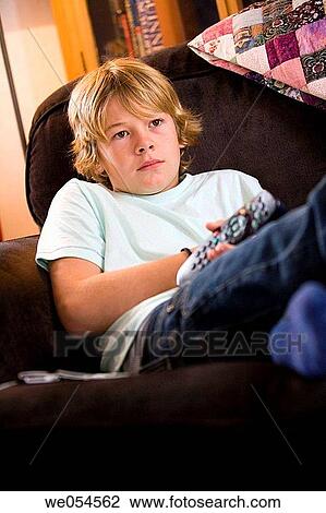 at-home, child, boy, blond, addiction View Large Photo Image Stock Image - at-home, child, boy, blond, addiction. Fotosearch