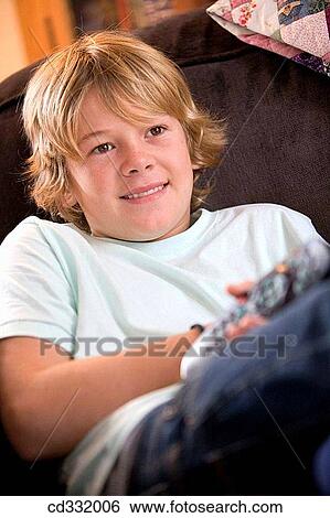 at-home, child, boy, blond, addiction View Large Photo Image Stock Photograph - at-home, child, boy, blond, addiction. Fotosearch