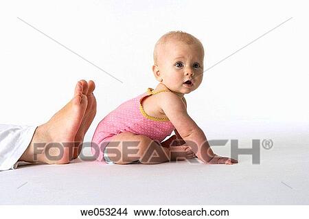 Picture - attentive, blond, barefoot, baby, attention. Fotosearch