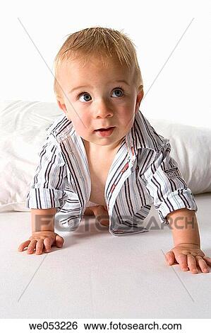 Stock Photograph - attentive, child, boy, baby, attention. Fotosearch