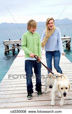 autumn, child, brother, boy, animal View Large Photo Image Stock Photo - autumn, child, brother, boy, animal. Fotosearch