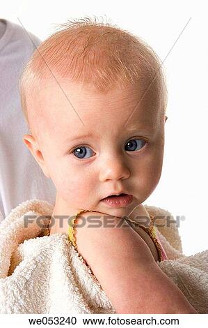 Stock Image - baby, blond, blue eyes, child, Close-up. Fotosearch