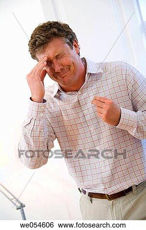 Stock Photograph - baby boomer, Bad mood, at-home. Fotosearch