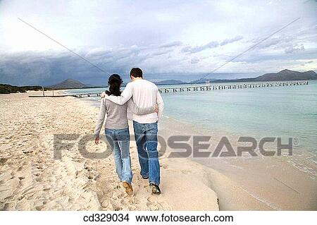 baby boomer, Best friend, beach, back view, autumn View Large Photo Image Picture - baby boomer, Best friend, beach, back view, autumn. Fotosearch