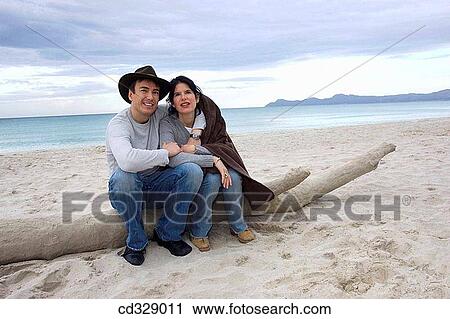 Stock Image - baby boomer, blanket, Best friend, beach, amusement. Fotosearch