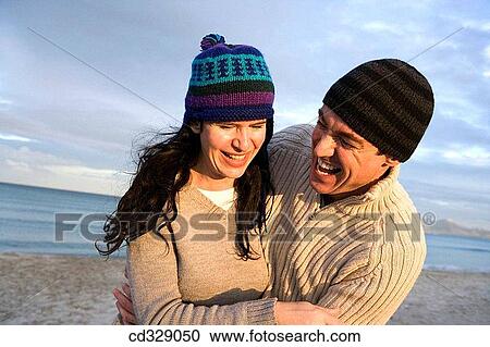 Stock Image - baby boomer, bond, Best friend, beach, autumn. Fotosearch