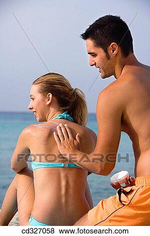 back view, Body care, beach, apply View Large Photo Image Stock Photo - back view, Body care, beach, apply. Fotosearch