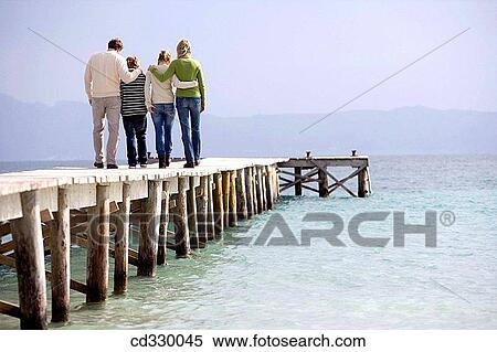 Stock Photography - back view, boy, brother, calm. Fotosearch
