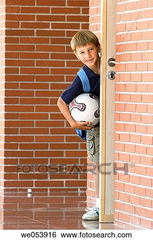 Stock Photograph - backpack, ball, blond, boy, child. Fotosearch