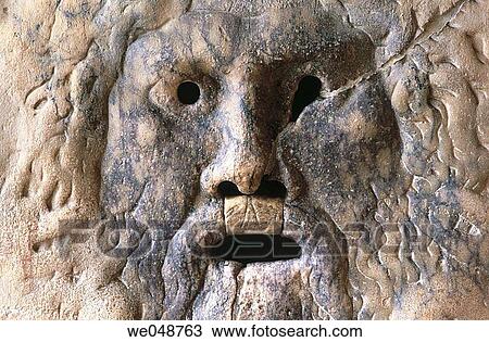 Bas-relief known as Mouth of Truth according to an old legend, in the porch of Santa Maria in Cosmedin church. Rome, Lazio, Italy View Large Photo Image Stock Image - Bas-relief known as Mouth of Truth according to an old legend, in the porch of Santa Maria in Cosmedin church. Rome, Lazio, Italy. Fotosearch