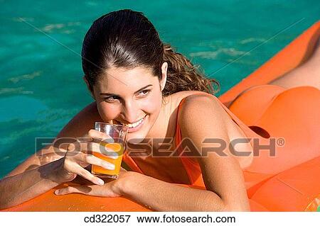bathe, air mattress, askance, amusement, air-bed, adolescence View Large Photo Image Stock Photo - bathe, air mattress, askance, amusement, air-bed, adolescence. Fotosearch