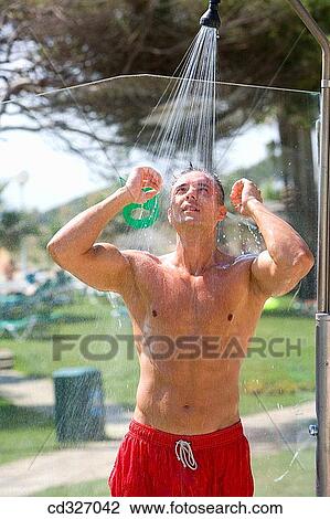 bathing-suit, coastal, coast, beach, Arms raised View Large Photo Image Stock Image - bathing-suit, coastal, coast, beach, Arms raised. Fotosearch