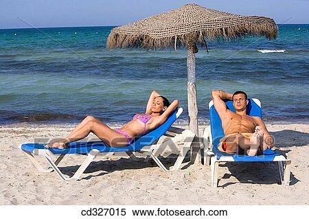 Stock Photography - beach, beach chair, calm. Fotosearch