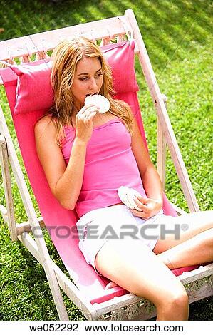 beach chair, bite, biting, blond View Large Photo Image Stock Image - beach chair, bite, biting, blond. Fotosearch
