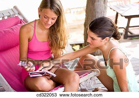 beach chair, brunette, blond, adolescence View Large Photo Image Stock Image - beach chair, brunette, blond, adolescence. Fotosearch