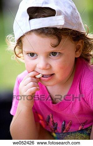 bite, cap, candy, biting, 3-4 years View Large Photo Image Stock Photograph - bite, cap, candy, biting, 3-4 years. Fotosearch