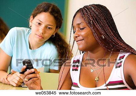 black, communication, classroom, cell phone, adolescence View Large Photo Image Stock Photography - black, communication, classroom, cell phone, adolescence. Fotosearch