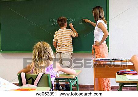 Stock Image - blackboard, boy, board, 30's. Fotosearch
