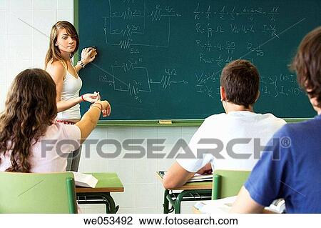 Stock Image - blackboard, chalkboard, boy, board, adolescence. Fotosearch