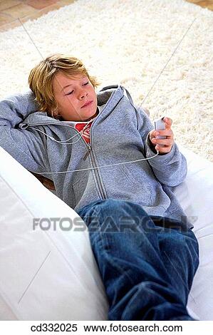 Stock Photography - blond, child, boy, at-home. Fotosearch