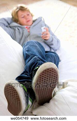 Stock Photo - blond, child, calm, boy, at-home. Fotosearch