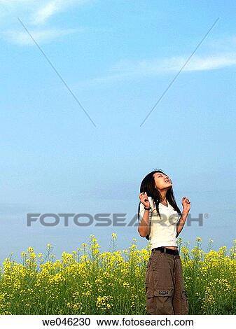 blue, brunette, blue sky, Asian View Large Photo Image Stock Image - blue, brunette, blue sky, Asian. Fotosearch