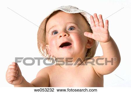 Stock Image - blue eyes, Arms raised, baby, attentive, attention, anticipation. Fotosearch