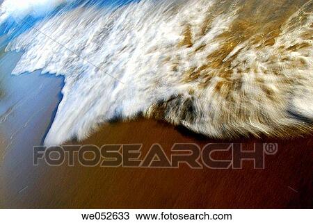 blurred white wave on beach shoreline View Large Photo Image Stock Image - blurred white wave on beach shoreline. Fotosearch