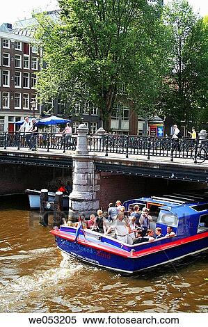 Stock Photography - Boat traffic at Prinsengracht/Leidsegracht, Amsterdam, Holland, Netherlands. Fotosearch