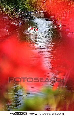 Boat with people on Egelantiersgracht in Amsterdam, Jordaan area, Holland, Netherlands View Large Photo Image Stock Photo - Boat with people on Egelantiersgracht in Amsterdam, Jordaan area, Holland, Netherlands. Fotosearch