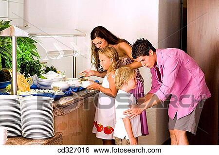 Stock Photograph - boy, buffet, child, childhood. Fotosearch