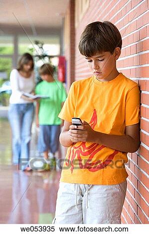 boy, child, cell phone, addiction View Large Photo Image Stock Photography - boy, child, cell phone, addiction. Fotosearch