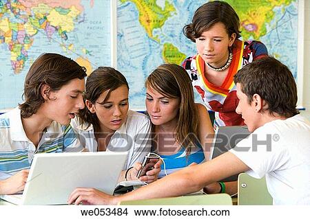 boy, classroom, cell phone, adolescence View Large Photo Image Picture - boy, classroom, cell phone, adolescence. Fotosearch