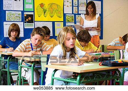 Stock Photography - boy, classroom, child, 30's. Fotosearch