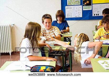 Stock Photo - boy, classroom, child, amusement. Fotosearch