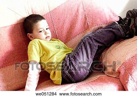Boy on coach View Large Photo Image Picture - Boy on coach. Fotosearch