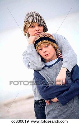 brother, arms folded, boy, beach, autumn, Arms crossed View Large Photo Image Stock Photo - brother, arms folded, boy, beach, autumn, Arms crossed. Fotosearch
