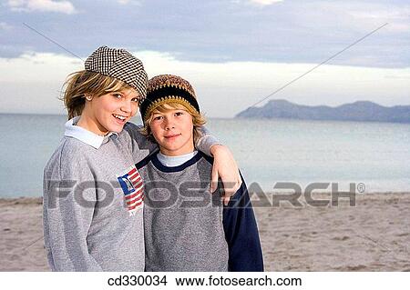 brother, beach, boy, bonding, bond, autumn View Large Photo Image Picture - brother, beach, boy, bonding, bond, autumn. Fotosearch