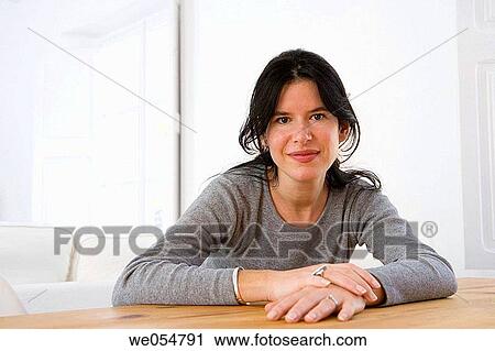 brunette, calm, at-home View Large Photo Image Stock Image - brunette, calm, at-home. Fotosearch