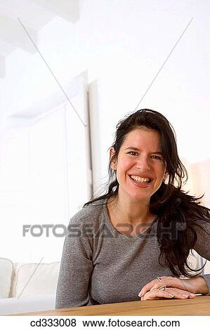 brunette, calm, at-home View Large Photo Image Stock Photo - brunette, calm, at-home. Fotosearch