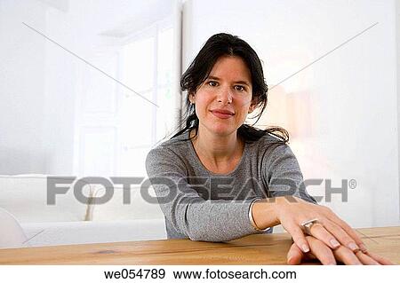 brunette, calm, at-home View Large Photo Image Stock Photo - brunette, calm, at-home. Fotosearch