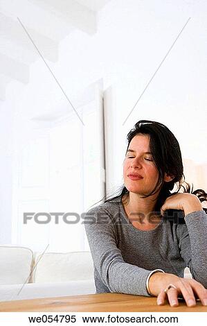 brunette, calm, at-home View Large Photo Image Stock Photography - brunette, calm, at-home. Fotosearch