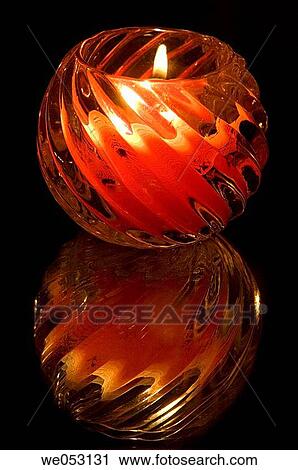 Candle in glass holder, with reflections View Large Photo Image Stock Image - Candle in glass holder, with reflections. Fotosearch