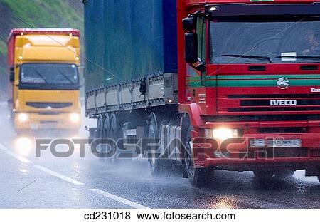 Stock Photo - car, day, dangerous, cloudy, automobile. Fotosearch