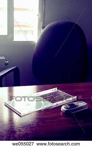 CD, cds, cell phone, chair, Close-up View Large Photo Image Stock Photo - CD, cds, cell phone, chair, Close-up. Fotosearch